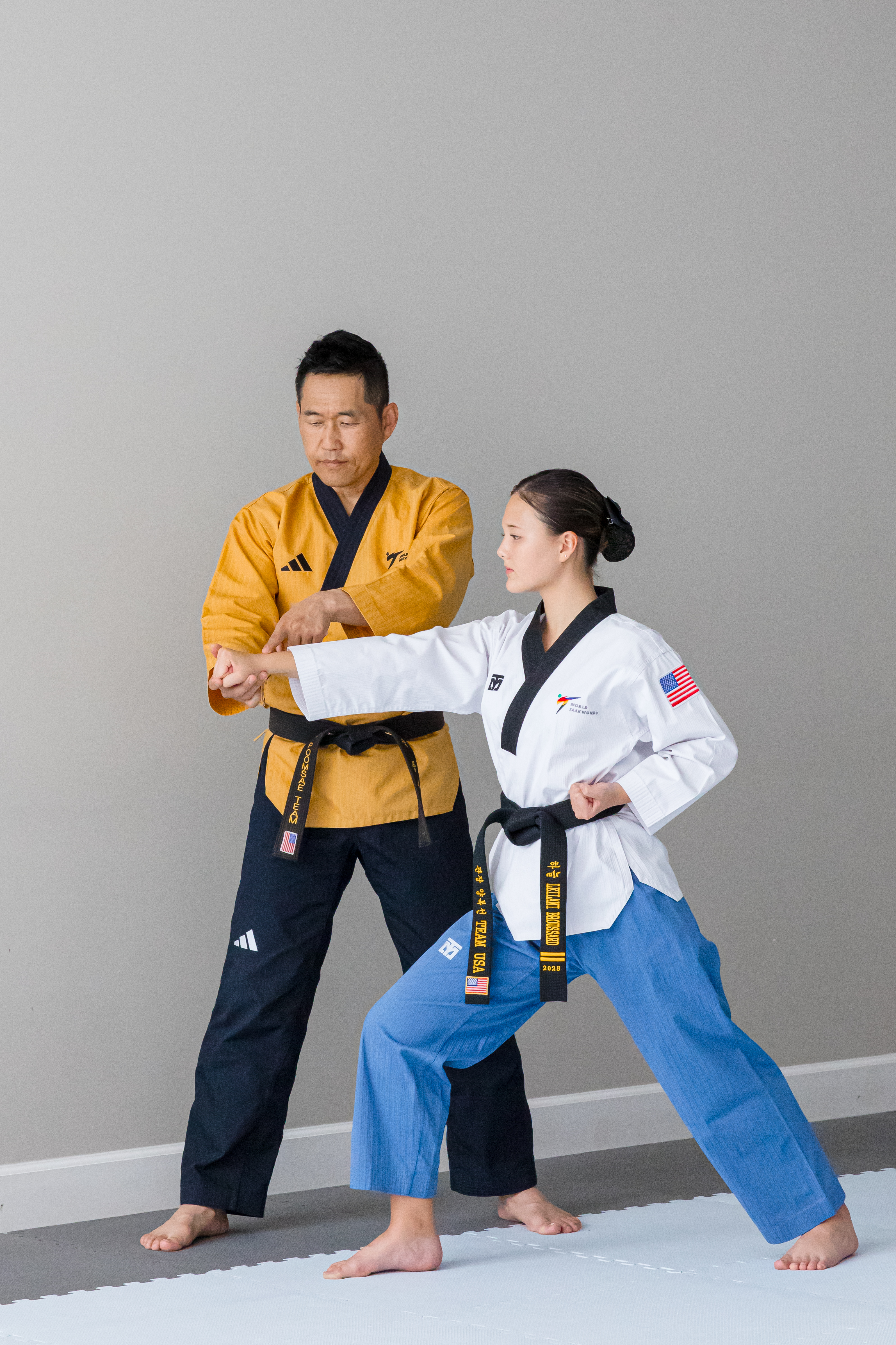 Kids, teens and adults training Taekwondo together in Plano